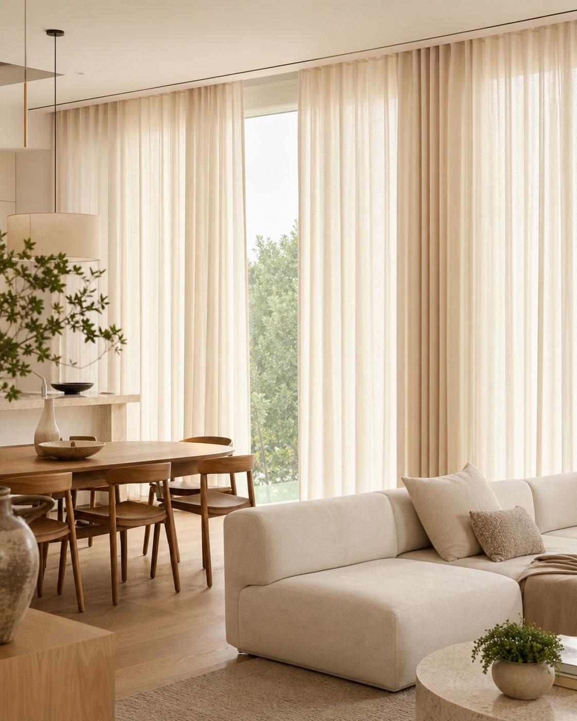 Laurel warm ivory floor-to-ceiling linen curtains in an open-plan room